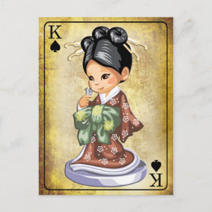 Japanese girl in kimono smelling a flower postcard