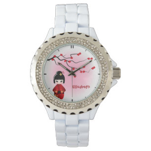 Japanese kokeshi doll at sakura blossoms name watch