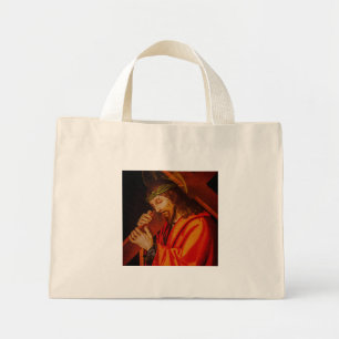 Jesus carrying the cross tote bag