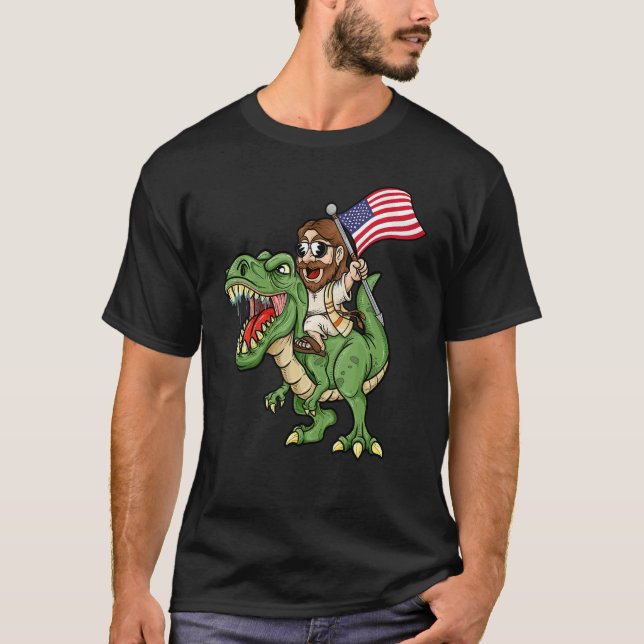 Jesus Riding A Tyrannosaurus Rex Dinosaur USA Flag T-Shirt (Front)