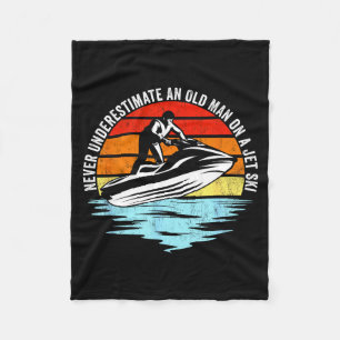 Jet skiing underestimate an old man on a jet ski fleece blanket