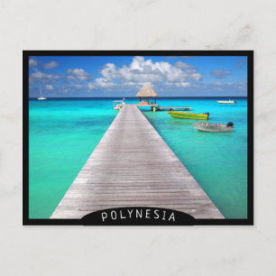 Jetty with boats in a tropical lagoon postcard