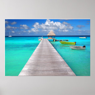 Jetty with boats in a tropical lagoon poster