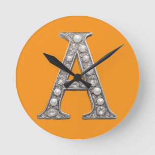 Jewel-Encrusted Letter A On Yellow Background Round Clock