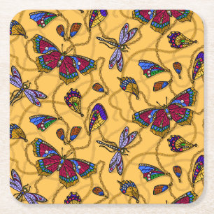 Jewellery butterflies and dragonflies on yellow square paper coaster