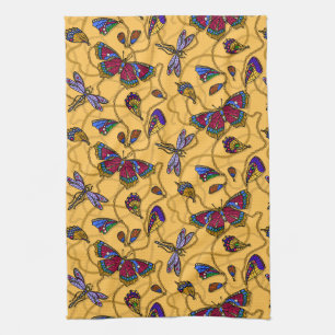 Jewellery butterflies and dragonflies on yellow tea towel