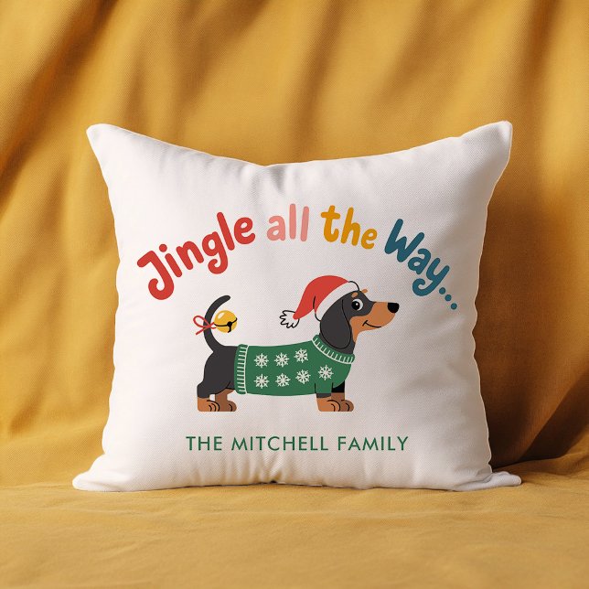 Jingle All the Way Dog – Custom Holiday Family  Cushion (White holiday pillow with a dachshund in a green sweater and Santa hat, “Jingle all the Way…”)