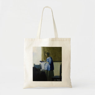 Johannes Vermeer - Woman in Blue Reading a Letter Tote Bag