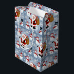 Jolly Santa Claus and Snowmen Christmas Pattern Medium Gift Bag<br><div class="desc">Bring the festive cheer to your holiday decor with this delightful Christmas pattern featuring a jolly Santa Claus carrying a sack full of gifts and adorable snowmen in cosy winter scarves and hats. Set against a whimsical backdrop of snowflakes, this design captures the magic of the holiday season and adds...</div>
