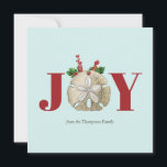 Joy Christmas Sand Dollar Holly Berries Coastal Holiday Card<br><div class="desc">A coastal themed Joy Christmas design featuring a sand dollar framed with the Christmas holly and berries on a light turquoise background. Perfect festive design for the holiday Xmas season.</div>