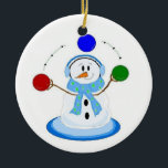 Juggling Snowman Ceramic Tree Decoration<br><div class="desc">A cool snowman juggling coloured balls of red,  blue and green. All wrapped up in his earmuffs and scarf.</div>