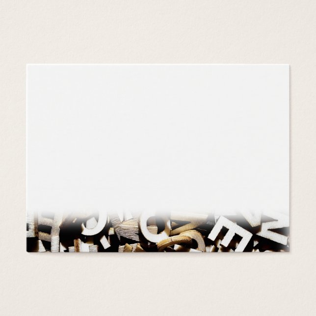 Jumbled letters made of wood close up (Front)