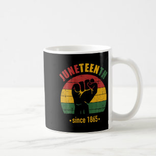 juneteenth since 1865 with pan african flag and coffee mug