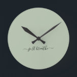Just breathe green elegant script yoga  round clock<br><div class="desc">Modern yoga clock with a chic sage green background and an elegant hand lettered black script with the quote "just breathe".</div>