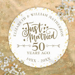 Just Married 50th Wedding Anniversary Classic Round Sticker<br><div class="desc">Featuring delicate golden love hearts confetti. Personalise with your special fiftieth golden anniversary information in chic gold lettering. Designed by Thisisnotme©</div>