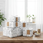 "Just Married" Chic Wrapping Paper<br><div class="desc">Prepare to impress the happy couple with wrapping paper that's as special as their day. This exquisite paper features a clean, hand-drawn pattern of timeless wedding symbols—from the bride's gown and groom's suit to the wedding cake and rings. Its refined monochrome design adds a touch of pure sophistication to any...</div>