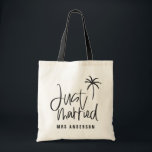 Just married palm tree wedding gift beach tote bag<br><div class="desc">Modern,  hand lettered script calligraphy to let everyone know this isn't just a holiday. This is your honeymoon. Part of a collection. Change the colour to customise.</div>