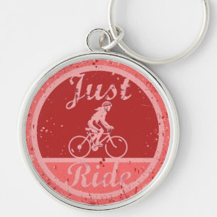 Just Ride Pink Paint Splashes Female Cyclist Key Ring