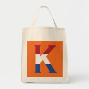 K Monogram overlaid on NLD Flag on or gtcnt Tote Bag