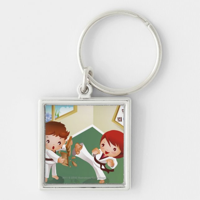Karate boy holding wood with another breaking it key ring (Front)