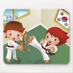 Karate boy holding wood with another breaking it mouse pad