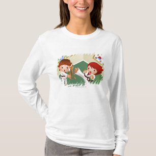 Karate boy holding wood with another breaking it T-Shirt