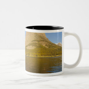 Kayaking in Swiftcurrent Lake at sunrise in the Two-Tone Coffee Mug
