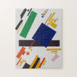 Kazimir Malevich Suprematism Composition  Jigsaw Puzzle<br><div class="desc">Kazimir Malevich's Suprematist Composition is a seminal work in abstract art that exemplifies his Suprematist philosophy, focusing on pure geometric forms and colour to express "intuitive reason" and the essence of painting itself. The painting features a dynamic arrangement of shapes-a skewed blue square, rectangles, and a bold deep-purple horizontal band-set...</div>