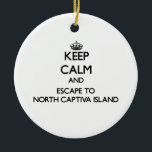 Keep calm and escape to North Captiva Island Flori Ceramic Tree Decoration<br><div class="desc">Use the search tool at my store to find other North Captiva Island merchandise. Keep calm and escape to North Captiva Island Florida products available on tshirts, sweatshirts, kids shirts, infant onsies, stickers, magnets, and much more North Captiva Island clothing fully customisable to your specifications. If you like what you...</div>