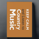 Keep Calm Country Plaque<br><div class="desc">The Keep Calm and Listen to Country Music design is perfect for country fans. Country magazine celebrates the breathtaking beauty, engaging people, enduring values and spiritually rewarding lifestyle of the American countryside. Our enthusiastic readers contribute nearly three-fourths of each magazine’s content, sharing their inspirational stories, landscape photography and passion for...</div>