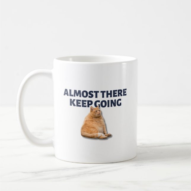 Keep going orange cat coffee mug (Left)