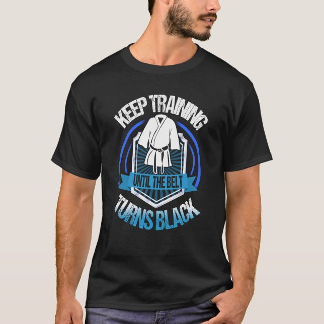 keep training until the belt turns black  Taekwond T-Shirt (Front)