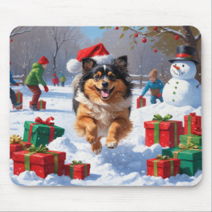 Keeshond Dog Running in Snow with Christmas Hat Mouse Pad