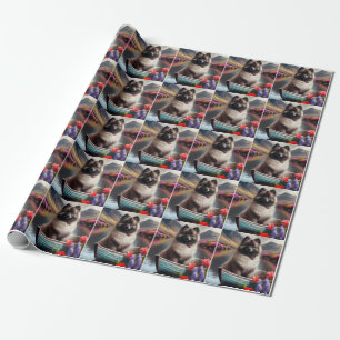 Keeshond on a Paddle: A Scenic Adventure Wrapping Paper