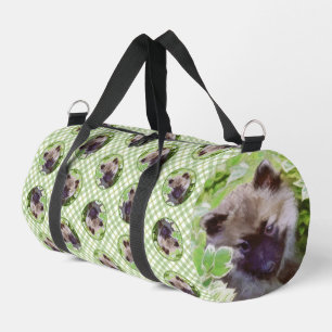Keeshond Painting Puppy in the Garden Original Art Duffle Bag
