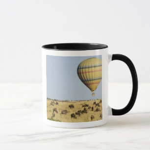 Kenya, Masai Mara. Tourists ride hot air balloon Mug