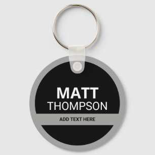 key holder with name . black and white ring