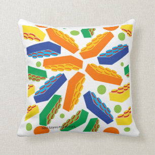 Kid's building blocks 'toss' on white Pillow