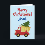 Kid's Christmas card with dump truck and pine tree<br><div class="desc">Kid's Christmas card with dump truck and pine tree. Cute Holiday card for children. Personalise with unique name.</div>