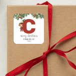 Kids Elf Inital C Christmas Square Sticker<br><div class="desc">Give the gift of personalised charm this Christmas! Our monogram stickers,  featuring Santa's elf hiding behind the letter C,  are a unique and thoughtful way to show your love. Customise with a name,  year and a heartfelt greeting. Make your Christmas gifts stand out!</div>