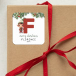 Kids Elf Initial F Christmas Square Sticker<br><div class="desc">Give the gift of personalised charm this Christmas! Our monogram stickers,  featuring Santa's elf hiding behind the letter F,  are a unique and thoughtful way to show your love. Customise with a name,  year and a heartfelt greeting. Make your Christmas gifts stand out!</div>