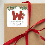 Kids Initial W Christmas Square Sticker<br><div class="desc">Give the gift of personalised charm this Christmas! Our monogram stickers,  featuring Santa's elf hiding behind the letter W,  are a unique and thoughtful way to show your love. Customise with a name,  year and a heartfelt greeting. Make your Christmas gifts stand out!</div>