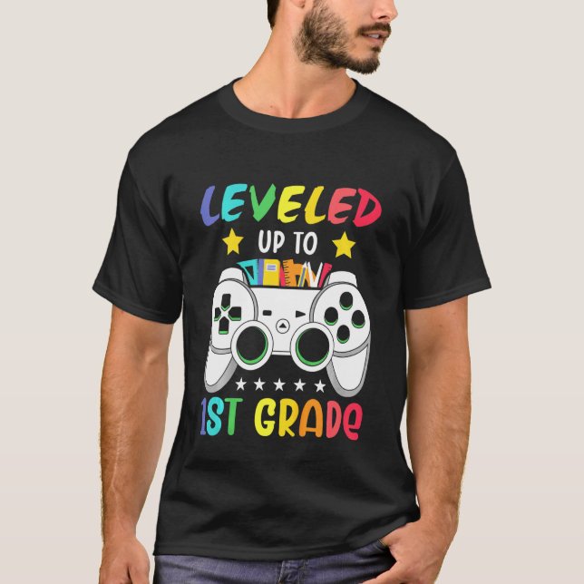 Kids Levelled Up To 1st Grade First Grader School  T-Shirt (Front)