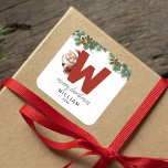 Kids Monogram Christmas Square Sticker<br><div class="desc">Give the gift of personalised charm this Christmas! Our monogram stickers,  featuring Santa hiding behind the letter W,  are a unique and thoughtful way to show your love. Customise with a name,  year and a heartfelt greeting. Make your Christmas gifts stand out!</div>