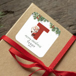 Kids Monogram Christmas Square Sticker<br><div class="desc">Give the gift of personalised charm this Christmas! Our monogram stickers,  featuring Santa hiding behind the letter T,  are a unique and thoughtful way to show your love. Customise with a name,  year and a heartfelt greeting. Make your Christmas gifts stand out!</div>
