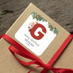 Kids Monogram Christmas Square Sticker<br><div class="desc">Give the gift of personalised charm this Christmas! Our monogram stickers,  featuring Santa hiding behind the letter G,  are a unique and thoughtful way to show your love. Customise with a name,  year and a heartfelt greeting. Make your Christmas gifts stand out!</div>