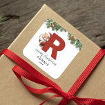 Kids Monogram Christmas Square Sticker<br><div class="desc">Give the gift of personalised charm this Christmas! Our monogram stickers,  featuring Santa hiding behind the letter R,  are a unique and thoughtful way to show your love. Customise with a name,  year and a heartfelt greeting. Make your Christmas gifts stand out!</div>