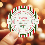 Kids Santa's Workshop North Pole Christmas Gift  Classic Round Sticker<br><div class="desc">These festive santa's workshop christmas gift stickers are perfect for kids holiday gifts. The design features traditional red and green colours with an official north pole seal with the words "special delivery from santa's workshop - north pole" in a fun font. Personalise the stickers with your child's name and the...</div>