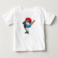 Killer whale at Cricket with Cricket bat