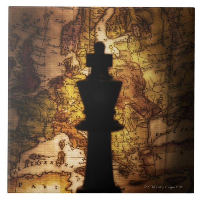 King chess piece on old world map ceramic tile (Front)